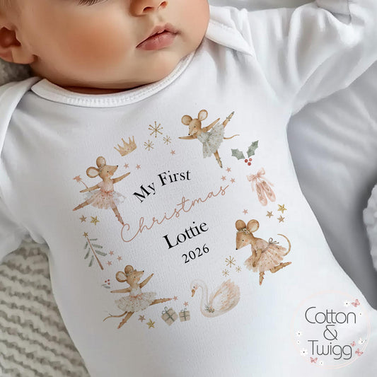 Personalised Ballerina Mice Baby's First Christmas sleepsuit from Cotton and Twigg, with a wreath of pink ballerina mice and the baby's name