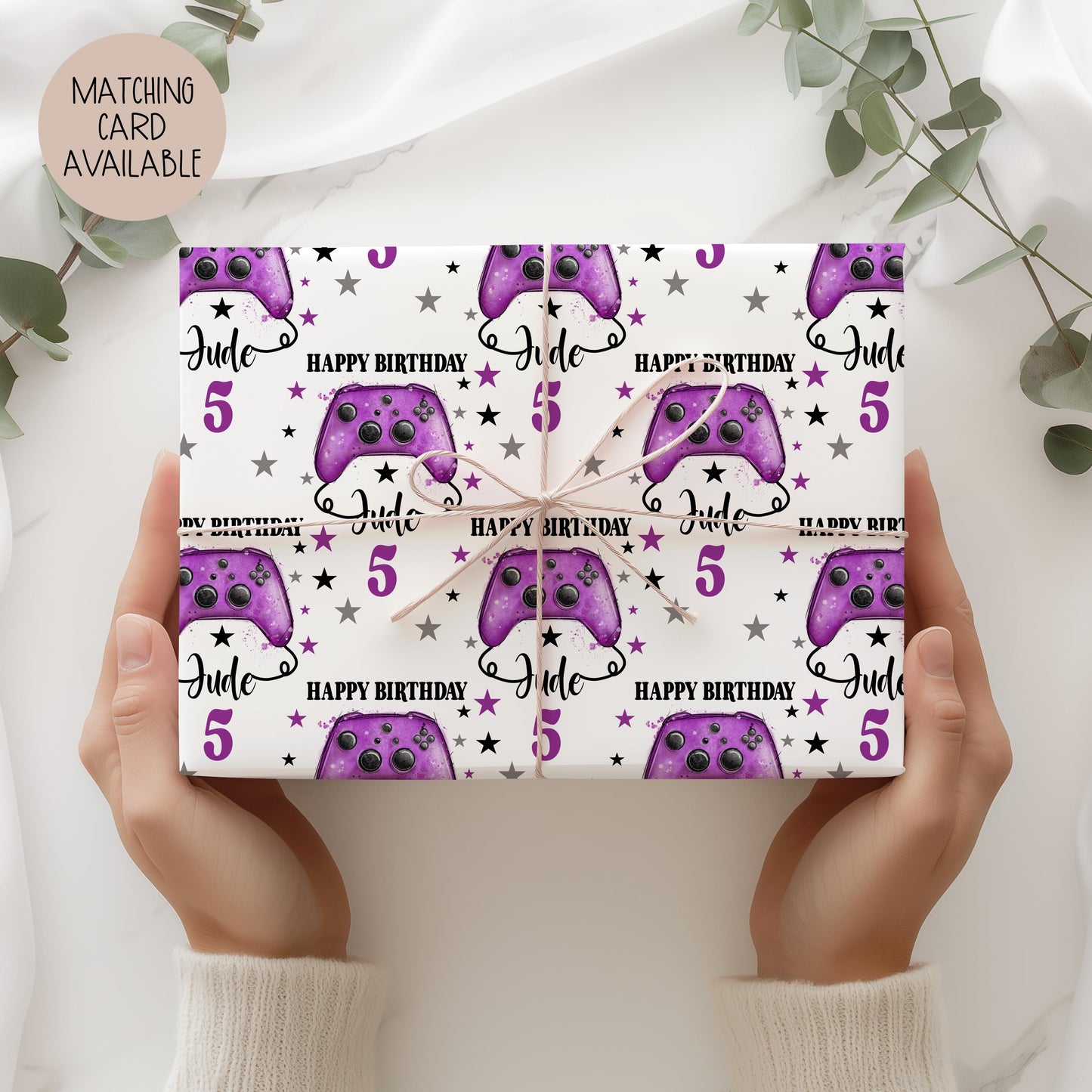 Personalised Luxury Gamer birthday gift wrap featuring a purple game controller. The wording Happy Birthday, Personalised with a name.
