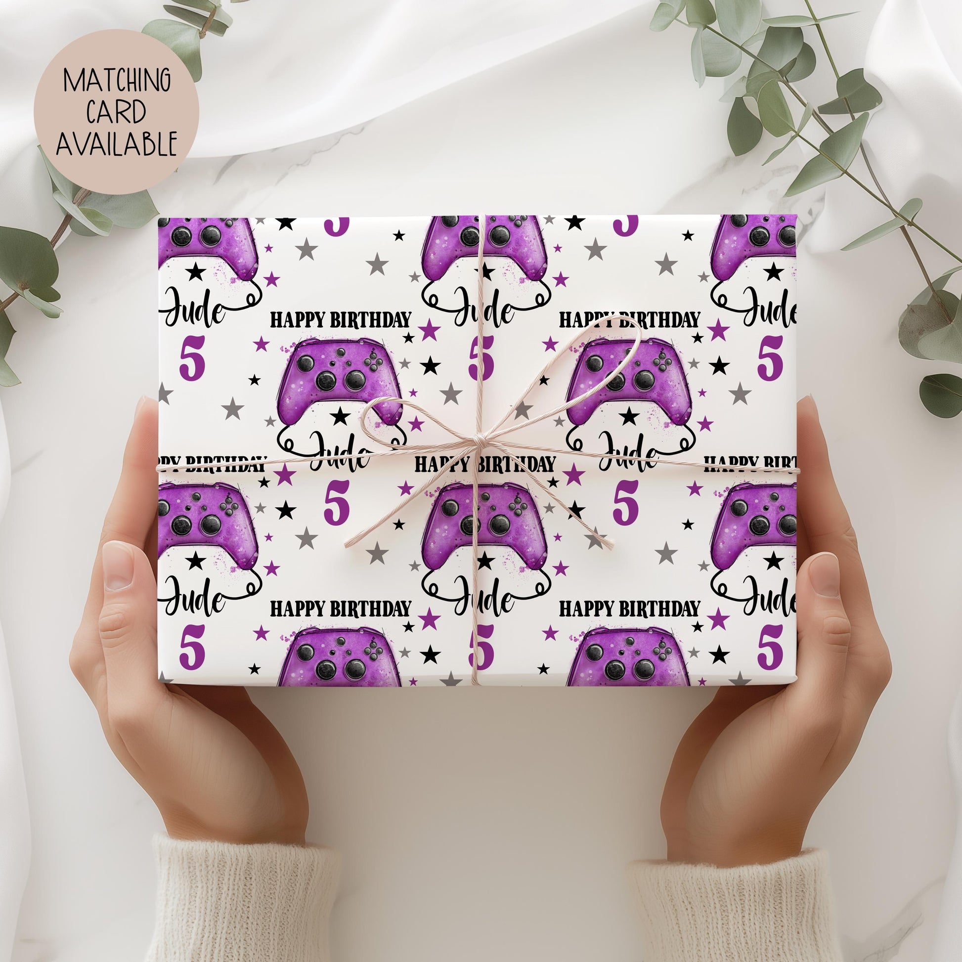 Personalised Luxury Gamer birthday gift wrap featuring a purple game controller. The wording Happy Birthday, Personalised with a name.