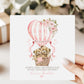 Personalised first Mother’s Day card for new mum, featuring two teddy bears in a wicker basket inside a pink hot air balloon with soft florals and hearts and the wording 'Happy 1st mothers day as my amazing mummy' Personalised with a name.