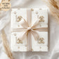 Personalised first birthday gift wrap featuring a repeating pattern of a cute neutral-toned bunny, balloons, and a large number 1. Design includes the wording ‘Happy 1st Birthday to our Wonderful Nephew’ and is personalised with a name. Soft beige and white colour palette with polka dot details.