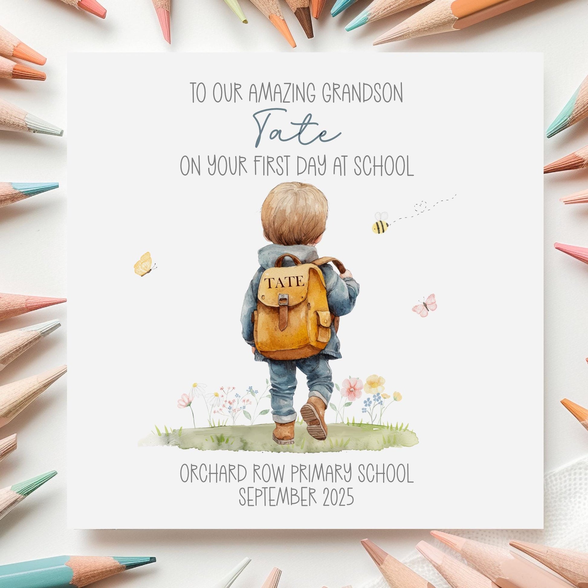 Personalised first day of school card featuring a cute illustration of a boy with a backpack, butterflies, flowers, and a smiling sun. Customisable with child’s name, school, and date. A unique keepsake card for boys or girls starting school, perfect gift from parents or grandparents.
