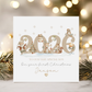 Personalised son first Christmas card with beige 2026 lettering, festive animals and the name Jaxson.