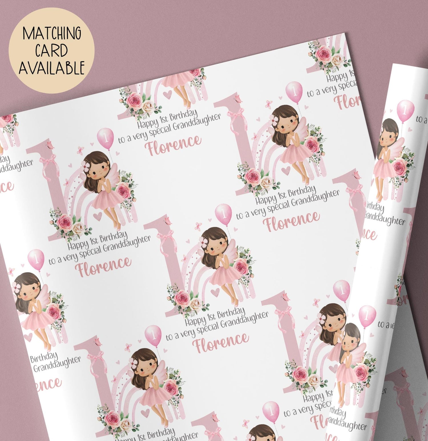 Personalised 1st birthday gift wrap featuring a cute fairy girl in a pink dress holding a balloon, sitting in front of a pastel rainbow and large pink number one, surrounded by floral accents. Customisable with child’s name and special message, perfect for a granddaughter’s/daughters 1st birthday.
