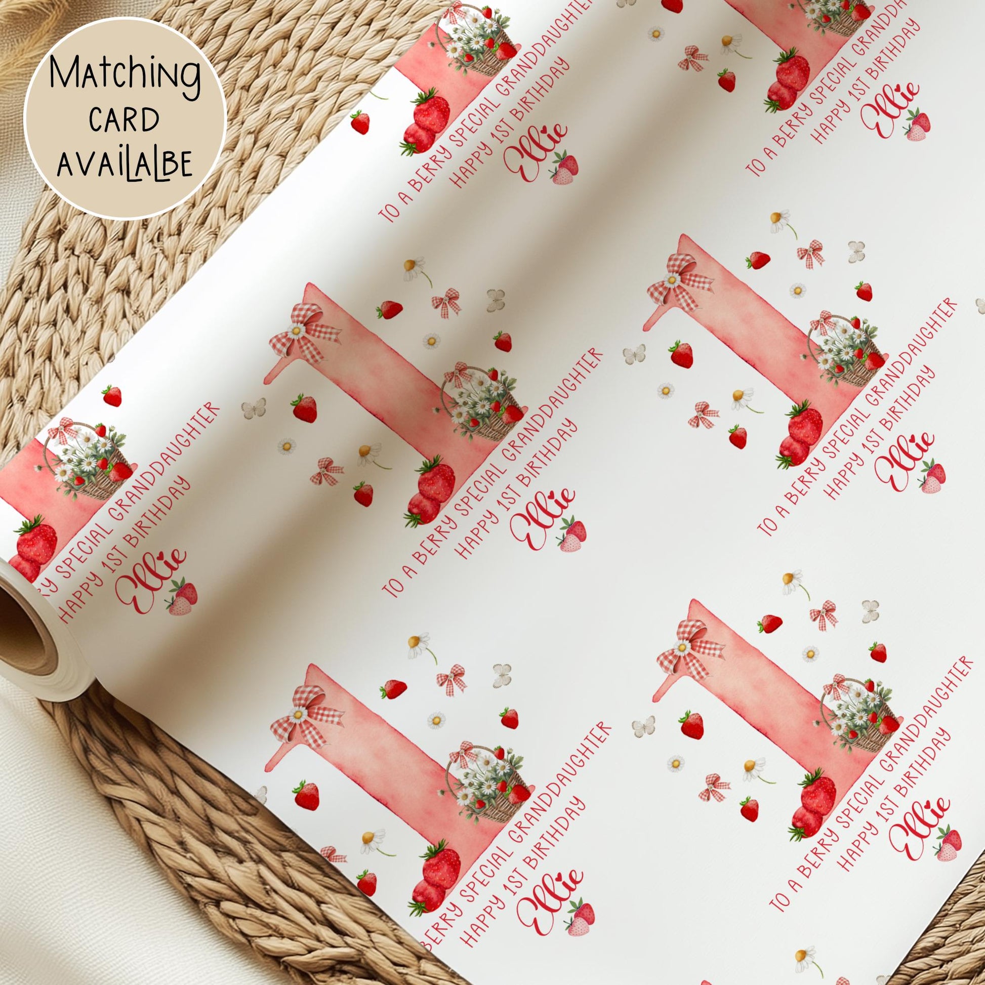Personalised gift wrap for a 1st birthday featuring a large red watercolor number &#39;1&#39; adorned with strawberries, gingham bows, and flowers. The design includes the text &#39;To a berry special granddaughterDaughter/any relation Happy 1st Birthday&#39; Personalised with a name.