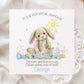 Personalised first Easter card for a grandson featuring a soft illustrated bunny holding a carrot, surrounded by pastel Easter eggs, flowers and a smiling sun, with “My First Easter” banner and space for a personalised name.