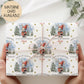 Personalised baby’s 1st Christmas Giftwrap for Boys & girls featuring a cute bunny in a red hat holding a present, snowy woodland background with fir trees and gold stars. Printed on premium 300gsm luxury paper.