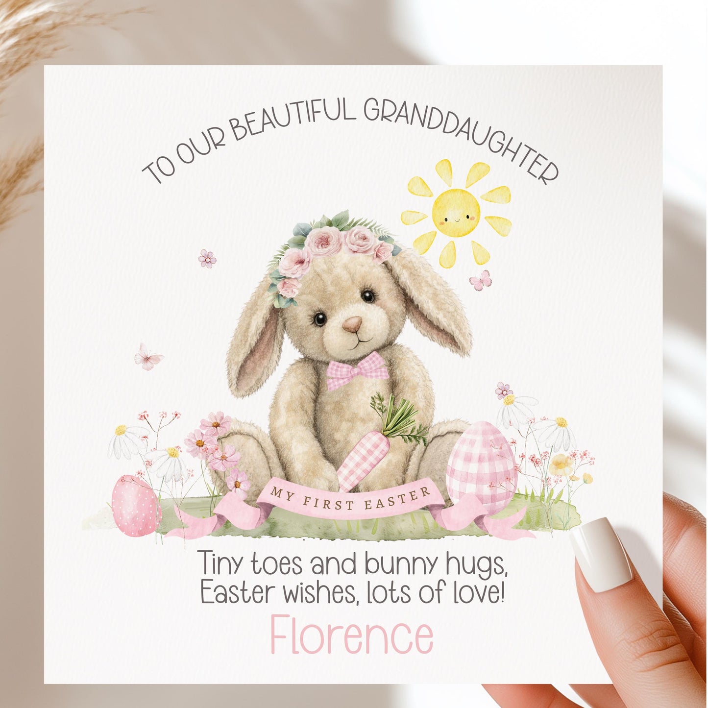 Personalised Easter card for a granddaughter featuring a soft illustrated bunny with a floral crown, Easter eggs, flowers and a smiling sun, with gentle pastel colours and space for a personalised name.