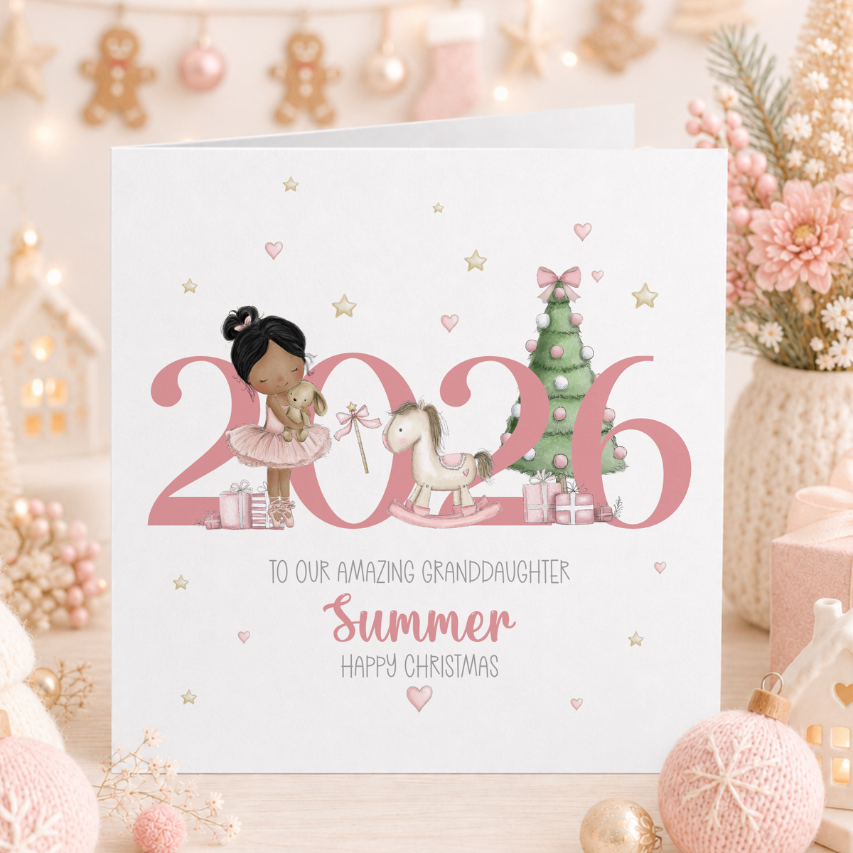 Personalised pink 2026 Christmas card with a black-haired ballerina, rocking horse and Christmas tree, for granddaughter Summer.