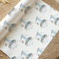 Luxury white personalized 1st birthday race car themed wrapping paper, featuring a watercolor pale blue racing car with the number 1 on the side of it & a large number 1 with bunting & balloons and the wording &#39;Happy 1st Birthday&#39; personalised with the child&#39;s name.