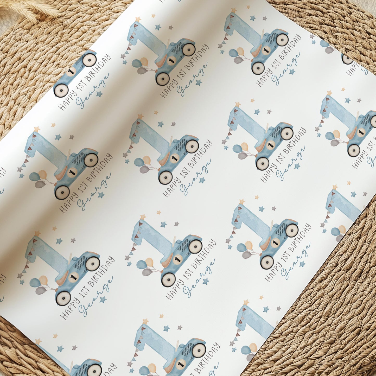 Luxury white personalized 1st birthday race car themed wrapping paper, featuring a watercolor pale blue racing car with the number 1 on the side of it & a large number 1 with bunting & balloons and the wording &#39;Happy 1st Birthday&#39; personalised with the child&#39;s name.