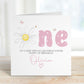 Luxury white linen, lightly textured 1st birthday card featuring a watercolor daisy & the one word ONE in pink polka dot & pretty butterflys & a bee & the wording To a very soecial granddaughter, happy 1st birthday, personalised with the childs name a little heart. Card measures 6 x 6 inches.
