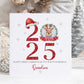 Personalised baby’s first Christmas card featuring a bright festive red design with watercolour illustrations and the year 2025. Perfect for a baby boy or girl’s first Christmas.