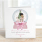 Square personalised Christmas card featuring a ballerina holding a teddy inside a pink snow globe with a Christmas tree, rocking horse, and presents. Text reads “Merry Christmas to our beautiful granddaughter/Daughter/Any relations&quot; Personalised with a name.