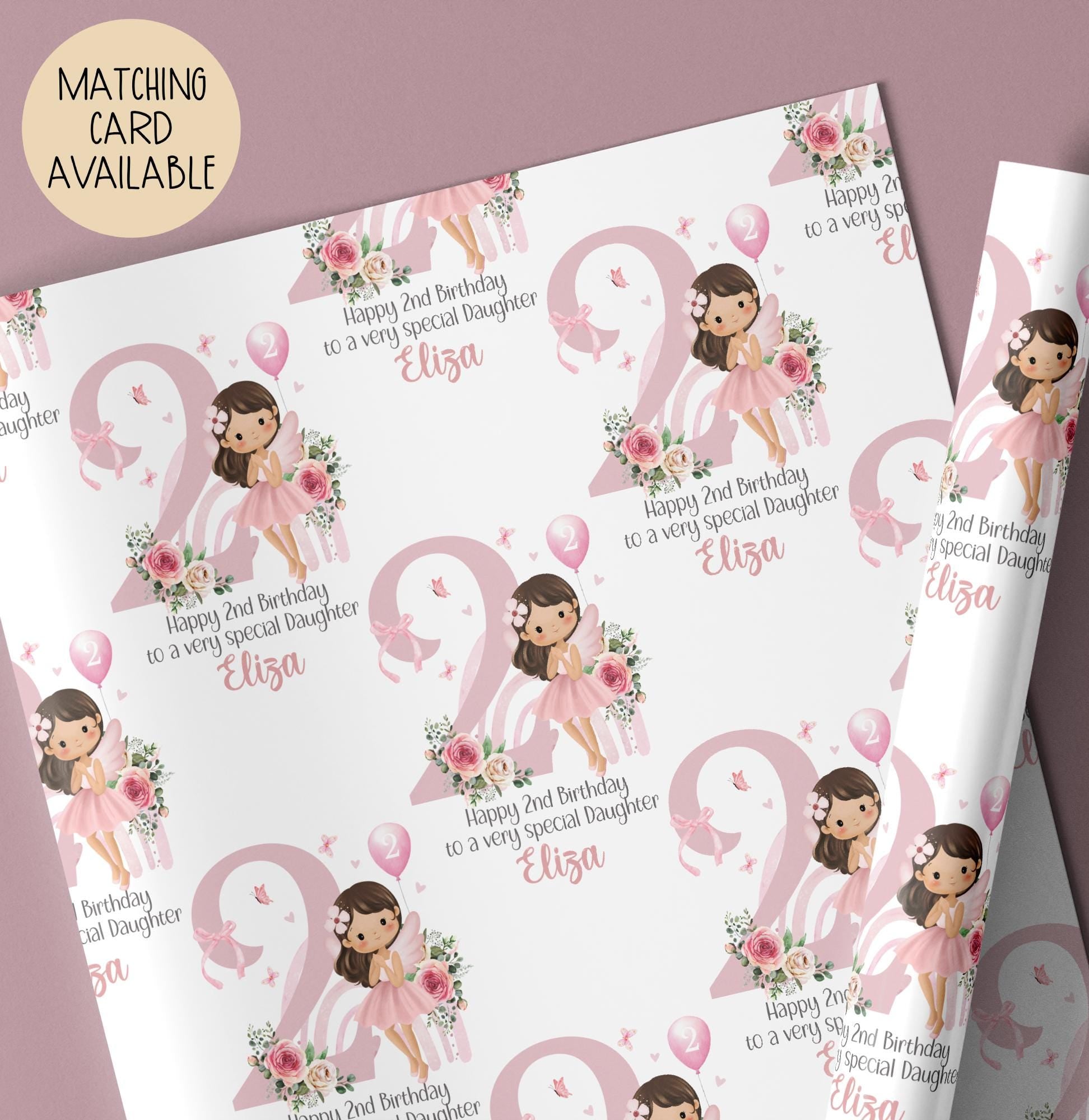 Personalised 2nd birthday gift wrap featuring a cute fairy girl in a pink dress holding a balloon, sitting in front of a pastel rainbow and large pink number one, surrounded by floral accents. Customisable with child’s name and special message, perfect for a granddaughter’s/daughters 1st birthday.