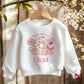 White cotton sweatshirt with the wording &#39;Two sweet&#39;  featuring a doughnut with heart shaped sprinkles & pink candies, personalised with childs name