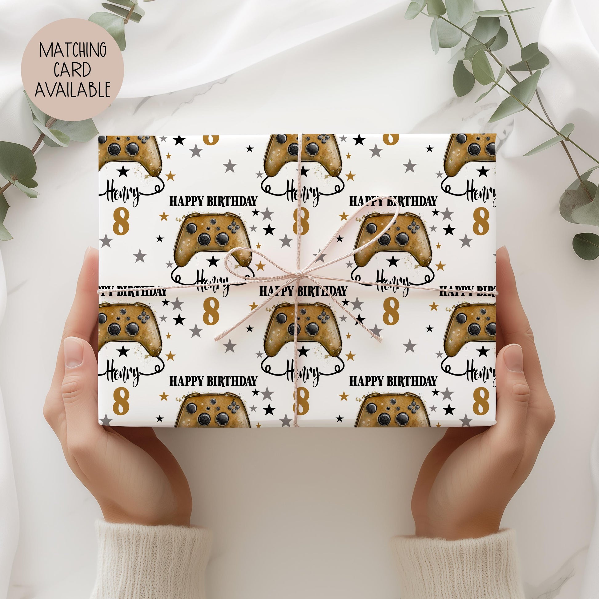 Personalised Luxury Gamer birthday gift wrap featuring a rust coloured game controller. The wording Happy Birthday, Personalised with a name.