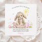 Personalised Easter card for a granddaughter featuring a soft illustrated bunny with a floral crown, Easter eggs, flowers and a smiling sun, with gentle pastel colours and space for a personalised name.