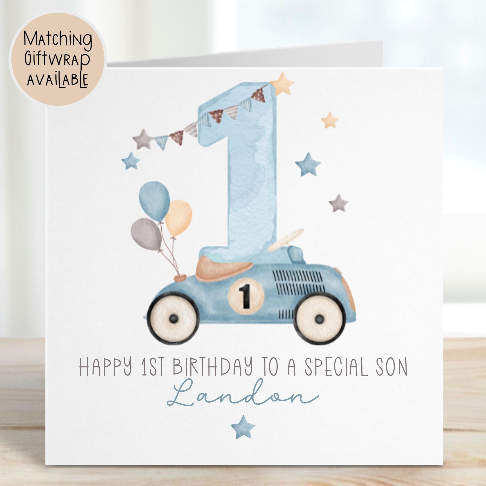 Luxury white linen, lightly textured 1st birthday card featuring a watercolor blue racing car with a number 1 on the side & beige seat & balloons to the back & a watercolor number 1 & a beige, brown & blue bunting & stars & the wording, Happy 1st birthday to a special Grandson/Son/Nephew/wording can be changed to suit. Personalised with the childs name a little star underneath. Card measures 6 x 6 inches.