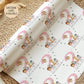 Personalised gift wrap for a 2nd birthday featuring a large pink number &#39;2&#39; surrounded by cute safari animals & grey stars. The design includes the text &#39; Happy 2nd Birthday&#39; Personalised with a name in multi-coloured text.