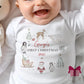 Arctic Animals Baby's First Christmas Sleepsuit, Vest & Bib