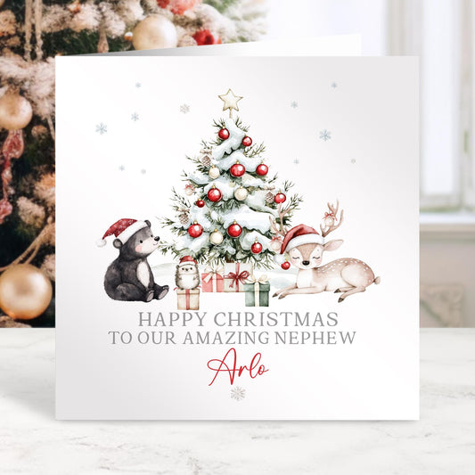 Christmas card with festive illustration of a tree, presents, and animals with personalized text.